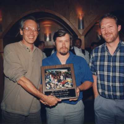 Three unknown men at the Call of the Wild awards ceremony.
