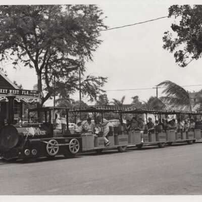 Conch tour train and passengers