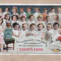 Group of children with a bottle of alubmented food
