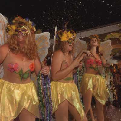 Unknown people dressed up on a float.
