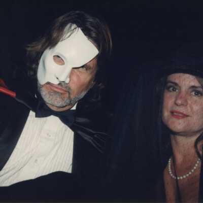 Unknown woman and man dressed up.