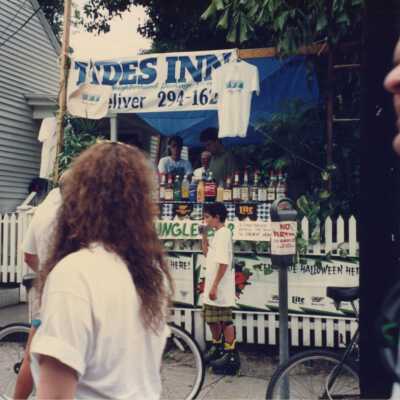 Unknown people at a street fair.