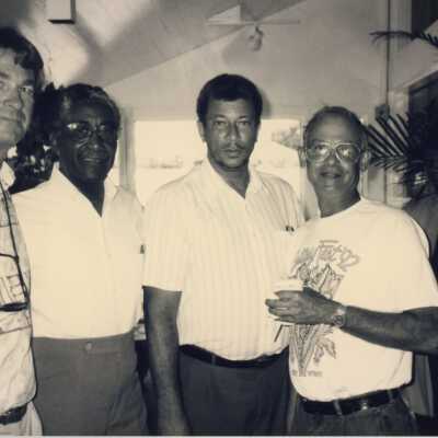 Four unknown men.