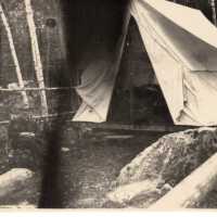          Man in front of tent picture number 3
   