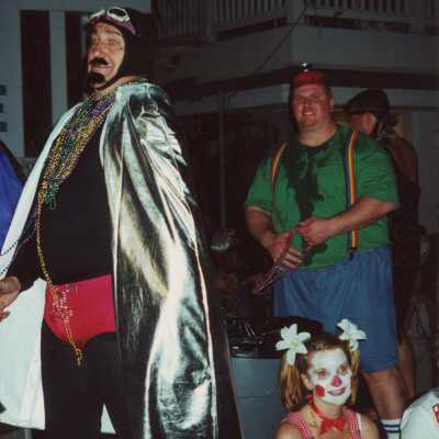 Unknown people dressed up.