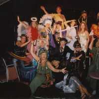 An unknown group of people dressed up.