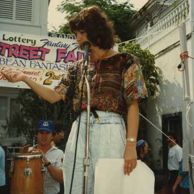 Unknown woman speaking at the FF street fair.