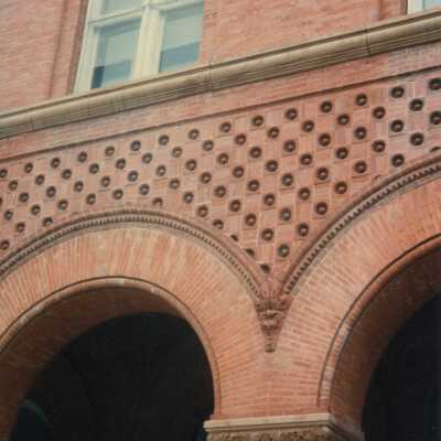 Brick and terra cotta arches.