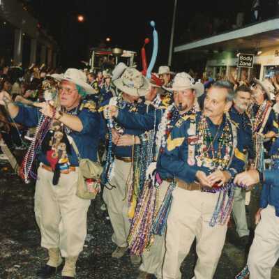 A group of unknown people dressed up.