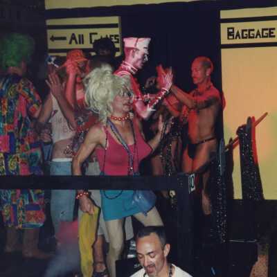 Unknown people dressed up on a float.