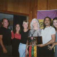 A group of unknown people at an awards ceremony.