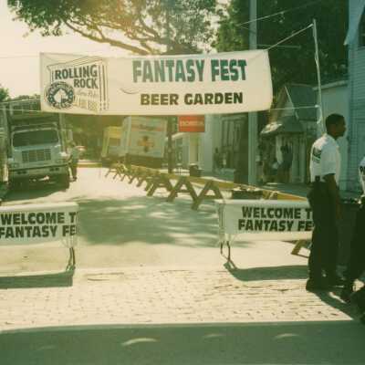 Unknown police officers walking near the set up for the beer garden.
