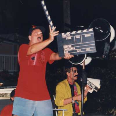 Unknown men staging as if they were directing.