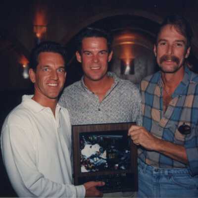 Three unknown men at the Call of the Wild awards ceremony.