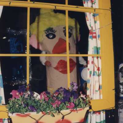 Unknown person dressed up on a float.