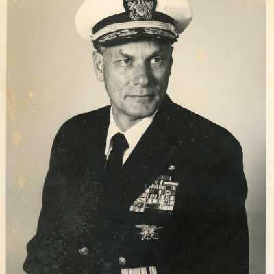 A photograph of a man in the U.S. Navy