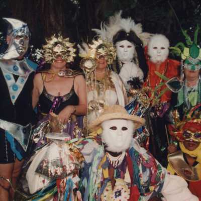 A group of unknown people dressed up.