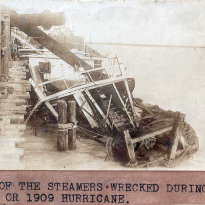 Steamer sinking at pier