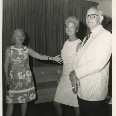 Unknown people standing at a party