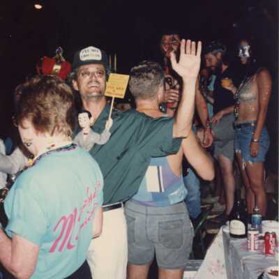 Unknown people at a Fantasy Fest party.