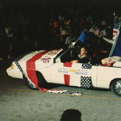 A float in the parade that reads King David and Queen Michelle.