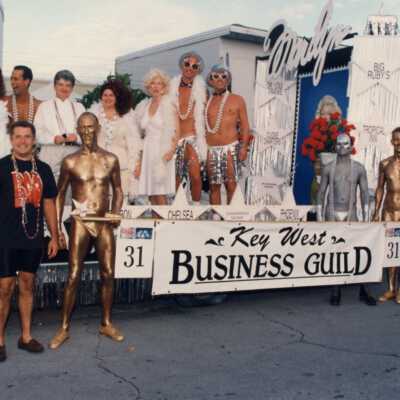 Unknown people dressed up on float 31, Key West Business Guild.