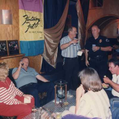 Unknown people talking at an award ceremony.