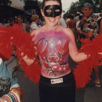 Unknown woman with her breast painted.