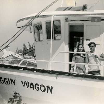 A boat and an unknown man and woman on board