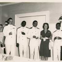 A group of unknown people at a party