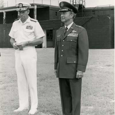 Unknown men in uniform standing outside