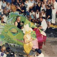 A small float in the parade being driven by a scooter.