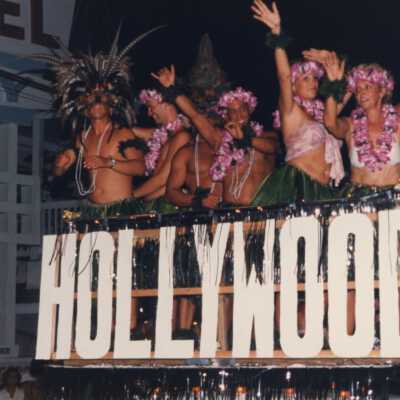 A float in the parade that reads Hollywood on the front.