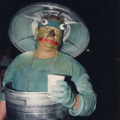 Unknown man dressed up as Oscar the grouch.