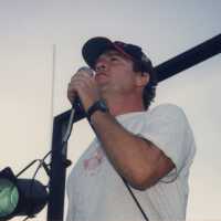 An unknown man talking.