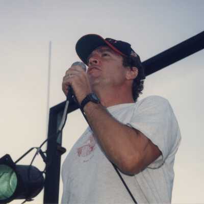 An unknown man talking.