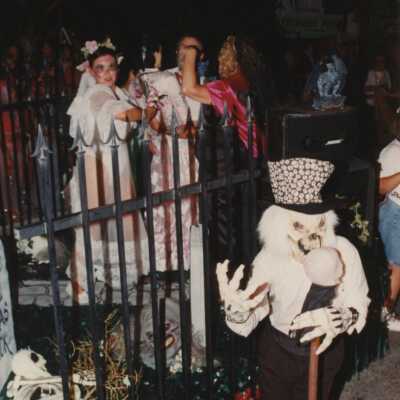 Unknown people dressed up on a float.