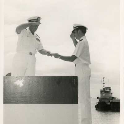 2 Men in uniform shaking hands