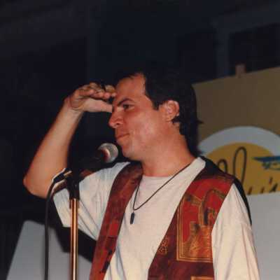 Unknown man talking at the Coors light parade workshop.