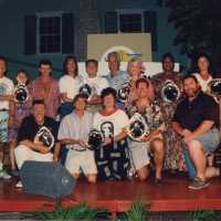 A group of unknown people at the awards ceremony.