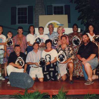 A group of unknown people at the awards ceremony.