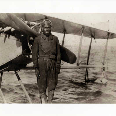 U.S. Navy Sailor with Seaplane