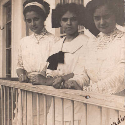 Unknown girls on a porch