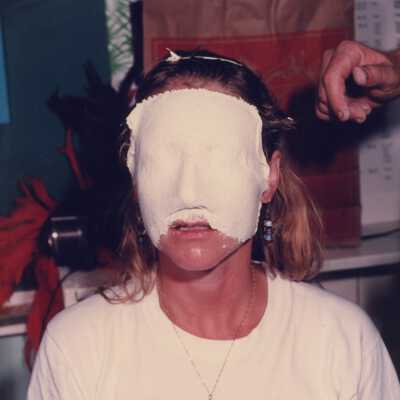 Unknown lady wearing a face mask.