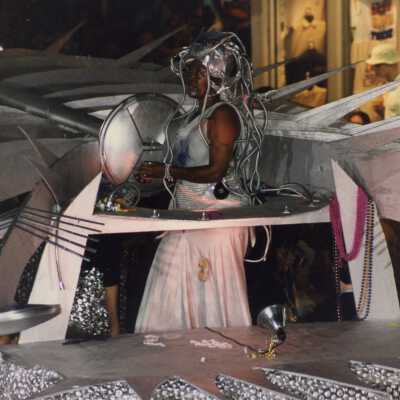 An unknown person dressed up on a float.