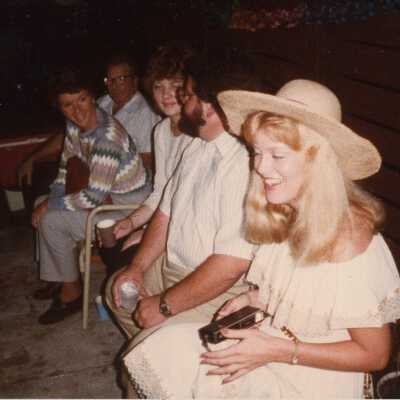 Unknown people sitting and talking