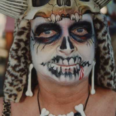 An unknown person with their face painted.
