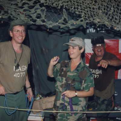 Unknown people dressed up on a float.