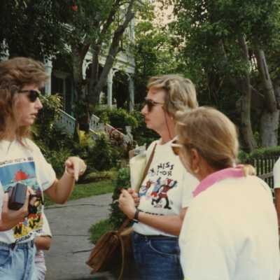 Unknown people talking.