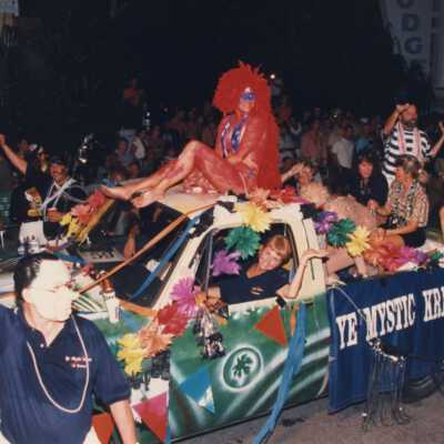 Unknown people on a float in the parade.